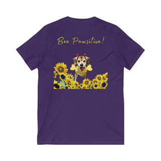 Bee Pawsitive Unisex V-neck Tee shirt in Team Purple. Shown is back of shirt showcasing a dog dressed as as bee in a a field of sunflowers with the phrase "Bee Pawsitive!" above it. The front features the Bee Pawsitive Benefit Beagle Logo.