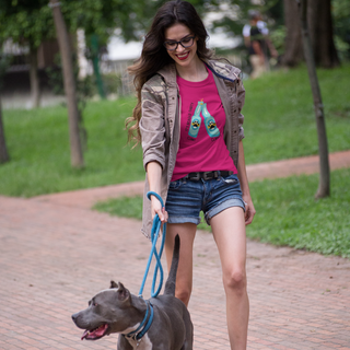 Beagle-Thirty Bottles Women's Midweight Cotton Tee in Heliconia Pink. The front of shirt showcases Two Paw Labeled Bottles clinking with the saying, "It's Beagle-Thirty". Back of shirt features corresponding Benefit Beagle Logo.