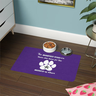 Brightest Star pet food mat in Purple. The Brightest Star design features a design on the back with the phrase "The brightest stars are those who shine for the benefit of others" with a pawprint and a nautical star.