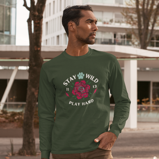 Stay Wild Ultra Cotton Long Sleeve Tee in Forest Green. The Stay Wild Design features a tattoo style rose with the phrase "Stay Wild, Play Hard" around it. The back of shirt features the Stay Wild Benefit Beagle Logo Design.