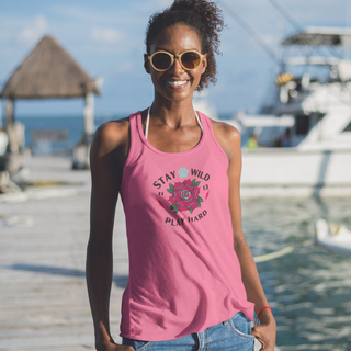 Stay Wild Women's Ideal Racerback Tank in Hot Pink. The Stay Wild Design features a tattoo style rose with the phrase "Stay Wild, Play Hard" around it.  The back of shirt features the Stay Wild Benefit Beagle Logo Design.