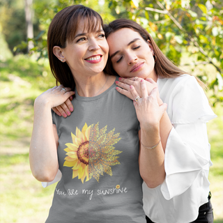 You are my Sunshine Women's Premium Tee shirt in Asphalt. Shown is the front showcasing a sunflower which is split down the middle and half is made out of paw prints. Underneath is the phrase "You are my Sunshine" . Back of shirt features the Sunflower Benefit Beagle Logo.