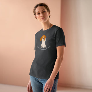 Easily Distracted Women's Premium Tee in Asphalt. Shown is front design featuring a dog waving with the saying "Easily Distracted by Dogs" below it. The back of shirt has the classic Benefit Beagle Logo.