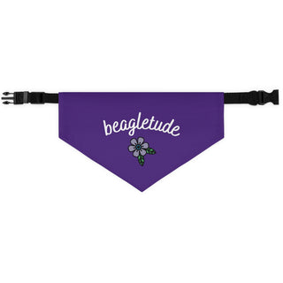 The Signature Tattoo Flower Dog Collar Bandana in Purple. The Signature Tattoo Flower design features the word "beagletude" with a tattoo style flower under it. Comes with adjustable black collar.