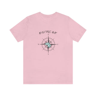 Adventures Await Unisex Jersey Short Sleeve Tee in Pink. The front of shirt features the Adventures Await design with a dog inside a nautical compass and the words "Adventures Await" above it. The back of the shirt has similar Benefit Beagle Logo.