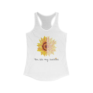 You are my Sunshine Women's Racerback Tank in White. Shown is the front showcasing a sunflower which is split down the middle and half is made out of paw prints. Underneath is the phrase "You are my Sunshine" . Back of shirt features the Sunflower Benefit Beagle Logo