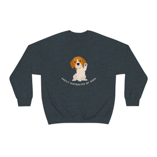 Easily Distracted Unisex Heavy Blend Crewneck Sweatshirt in Dark Heather. Shown is front design featuring a dog waving with the saying "Easily Distracted by Dogs" below it. The back of shirt has the classic Benefit Beagle Logo.