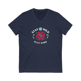 Stay Wild Unisex Jersey Short Sleeve V-Neck Tee in Navy. The Stay Wild Design features a tattoo style rose with the phrase "Stay Wild, Play Hard" around it. The back of shirt features the Stay Wild Benefit Beagle Logo Design.