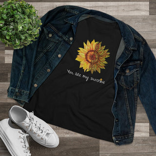 You are my Sunshine Women's Premium Tee shirt in Black. Shown is the front showcasing a sunflower which is split down the middle and half is made out of paw prints. Underneath is the phrase "You are my Sunshine" . Back of shirt features the Sunflower Benefit Beagle Logo.