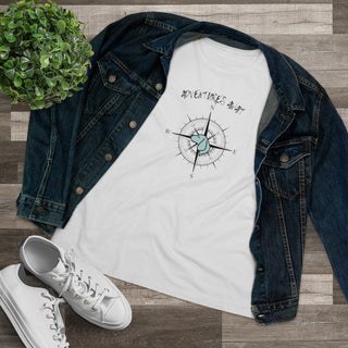 Adventures Await Women's Premium Tee in White. The front of shirt features the Adventures Await design with a dog inside a nautical compass and the words "Adventures Await" above it. The back of the shirt has similar Benefit Beagle Logo.