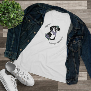 Signature Tattoo Flowers Women's Premium Tee in White. Shown is front of shirt with the Signature Tattoo Flowers design featuring a dog with flowers around it and the phrase "Beagletude" and "Nothing is Impawssible". Back of shirt features the Benefit Beagle Logo.