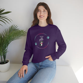 Dog Hair is my Glitter Unisex Crewneck in Purple. The Dog Hair is my Glitter design features a dog with the phrase "Dog Hair is my Glitter" above it and it is surrounded by a circle with paw prints.