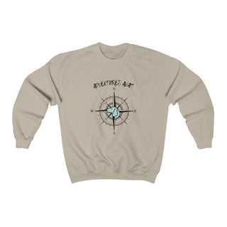 Adventures Await Unisex Crewneck Sweatshirt in Sand. The front of shirt features the Adventures Await design with a dog inside a nautical compass and the words "Adventures Await" above it. The back of the shirt has similar Benefit Beagle Logo.