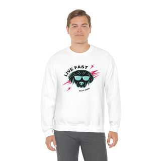 Play Hard Unisex Heavy Blend Crewneck Sweatshirt in White. The design features a cool dog with sunglasses and lightening bolts around it. The phrase "Live Fast, Play Hard" is around the design.