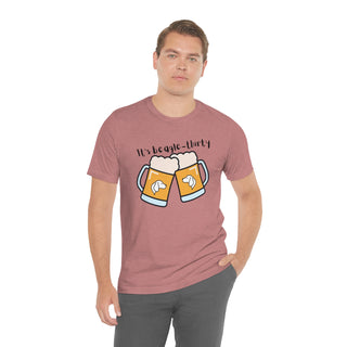 Beagle-Thirty Mugs Unisex Jersey Short Sleeve Tee in Heather Mauve. The front of shirt showcases Two Dog Adorned Mugs clinking with the saying, "It's Beagle-Thirty" above it. Back of shirt features corresponding Benefit Beagle Logo.