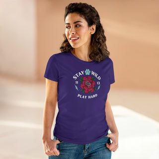 Stay Wild Women's Midweight Cotton Tee in Purple. Shown is front of Stay Wild Design features a tattoo style rose with the phrase "Stay Wild, Play Hard" around it. The back of shirt features the Stay Wild Benefit Beagle Logo Design.