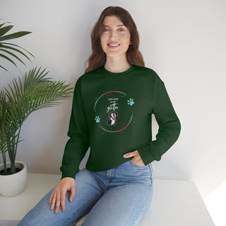 Dog Hair is my Glitter Unisex Crewneck in Forest Green. The Dog Hair is my Glitter design features a dog with the phrase "Dog Hair is my Glitter" above it and it is surrounded by a circle with paw prints.