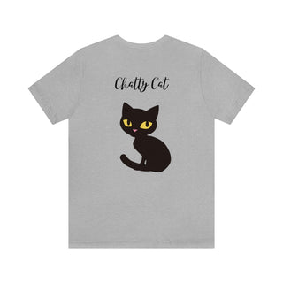 Meow Unisex Tee in Athletic Heather. Shown is back showcasing a wide eyed black cartoon cat with the phrase "Chatty Cat" above it. On front of shirt is the Benefit Beagle Logo featuring a peeping cat.