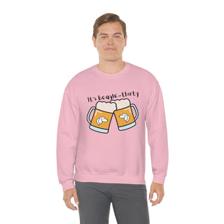 Beagle-Thirty Mugs Unisex Heavy Blend Crewneck Sweatshirt in Light Pink. The front of shirt showcases Two Dog Adorned Mugs clinking with the saying, "It's Beagle-Thirty" above it. Back of shirt features corresponding Benefit Beagle Logo.