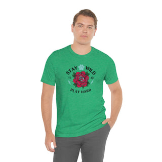 Stay Wild Unisex Premium Tee in Heather Kelly. Shown is front of Stay Wild Design features a tattoo style rose with the phrase "Stay Wild, Play Hard" around it. The back of shirt features the Stay Wild Benefit Beagle Logo Design.