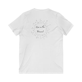 Live in the Moment V-Neck Tee in White. The Live in the Moment design features a graphic on the back with the phrase "Live in the Moment" surrounded by shooting stars.