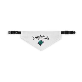 The Signature Tattoo Roses Dog Collar Bandana in White. The Signature Tattoo Roses design features the word "beagletude" with a tattoo style rose under it. Comes with adjustable black collar.