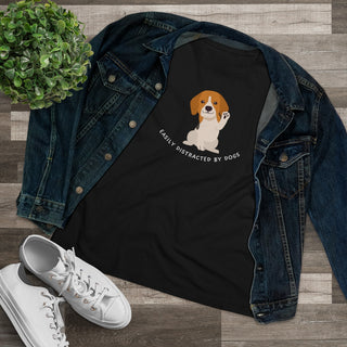 Easily Distracted Women's Premium Tee in Black. Shown is front design featuring a dog waving with the saying "Easily Distracted by Dogs" below it. The back of shirt has the classic Benefit Beagle Logo.