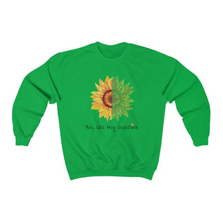 You are my Sunshine Unisex Crewneck Sweatshirt in Irish Green. Shown is the front showcasing a sunflower which is split down the middle and half is made out of paw prints. Underneath is the phrase "You are my Sunshine" . Back of shirt features the Sunflower Benefit Beagle Logo.