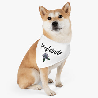 Dog wearing the Signature Tattoo Flower Dog Collar Bandana in White. The Signature Tattoo Flower design features the word "beagletude" with a tattoo style flower under it. Comes with adjustable black collar.