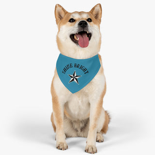 Dog wearing the Brightest Star Pet Bandana Collar in blue. The Brightest Star design features the phrase "Shine Bright" with a nautical star. Comes with adjustable black collar.