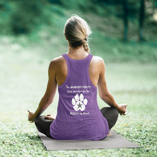 Brightest Star Women's Ideal Racerback Tank in Purple. The Brightest Star design features a design on the back with the phrase "The brightest stars are those who shine for the benefit of others" with a pawprint and a nautical star.