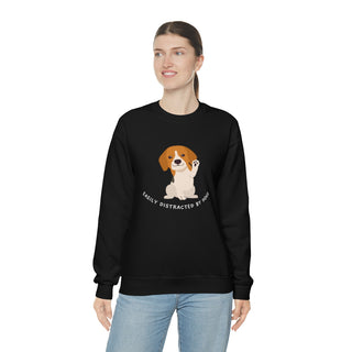 Easily Distracted Unisex Heavy Blend Crewneck Sweatshirt in Black. Shown is front design featuring a dog waving with the saying "Easily Distracted by Dogs" below it. The back of shirt has the classic Benefit Beagle Logo.