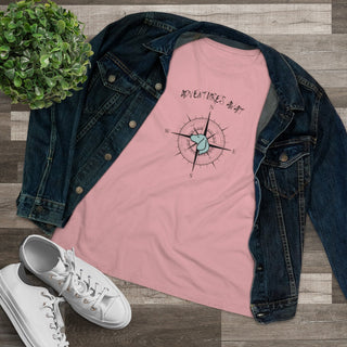 Adventures Await Women's Premium Tee in Pink. The front of shirt features the Adventures Await design with a dog inside a nautical compass and the words "Adventures Await" above it. The back of the shirt has similar Benefit Beagle Logo.