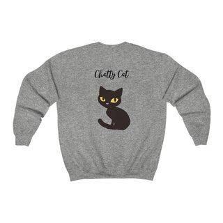 Meow Unisex Crewneck Sweatshirt in Sport Grey. Shown is back showcasing a wide eyed black cartoon cat with the phrase "Chatty Cat" above it. On front of shirt is the Benefit Beagle Logo featuring a peeping cat.