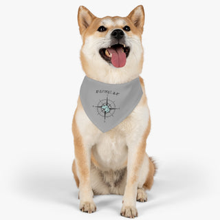 Dog wearing Adventures Await Dog Collar Bandana in Grey. The Adventures Await design features a nautical compass with the profile of a dog in the center. Comes with adjustable black collar. 