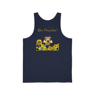 Bee Pawsitive Unisex Jersey Tank shirt in Navy. Shown is back of shirt showcasing a dog dressed as as bee in a a field of sunflowers with the phrase "Bee Pawsitive!" above it. The front features the Bee Pawsitive Benefit Beagle Logo.