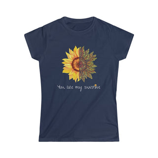 You are my Sunshine Women's Softstyle Tee in Navy. Shown is the front showcasing a sunflower which is split down the middle and half is made out of paw prints. Underneath is the phrase "You are my Sunshine" . Back of shirt features the Sunflower Benefit Beagle Logo.