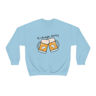 Beagle-Thirty Mugs Unisex Heavy Blend Crewneck Sweatshirt in Light Blue. The front of shirt showcases Two Dog Adorned Mugs clinking with the saying, "It's Beagle-Thirty" above it. Back of shirt features corresponding Benefit Beagle Logo.