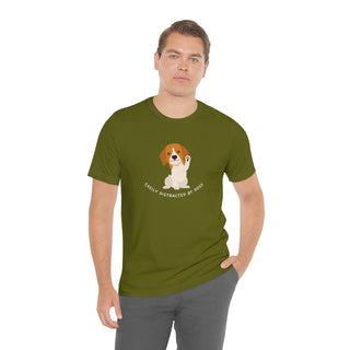 Easily Distracted Unisex Jersey Short Sleeve Tee in Olive. Shown is front design featuring a dog waving with the saying "Easily Distracted by Dogs" below it. The back of shirt has the classic Benefit Beagle Logo.