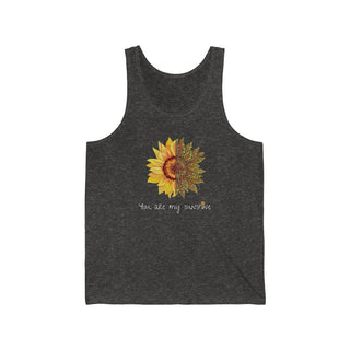 You are my Sunshine Unisex Jersey Tank in Charcoal Black Triblend. Shown is the front showcasing a sunflower which is split down the middle and half is made out of paw prints. Underneath is the phrase "You are my Sunshine" . Back of shirt features the Sunflower Benefit Beagle Logo.