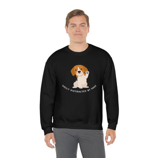 Easily Distracted Unisex Heavy Blend Crewneck Sweatshirt in Black. Shown is front design featuring a dog waving with the saying "Easily Distracted by Dogs" below it. The back of shirt has the classic Benefit Beagle Logo.