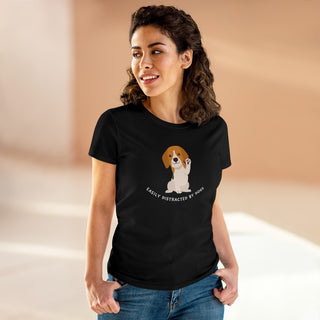 Easily Distracted Women's Midweight Cotton Tee in Team Black. Shown is front design featuring a dog waving with the saying "Easily Distracted by Dogs" below it. The back of shirt has the classic Benefit Beagle Logo.