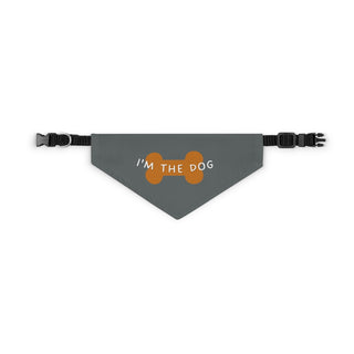 Easily Distracted Dog Collar Bandana in Grey. The design features a large dog bone with the words, "I'M THE DOG" written across it. Comes with adjustable black collar.