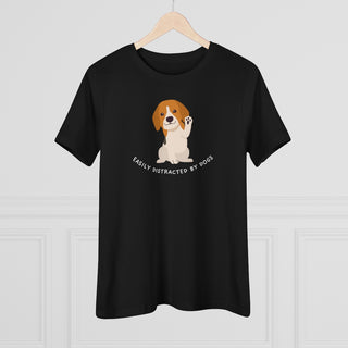 Easily Distracted Women's Premium Tee in Black. Shown is front design featuring a dog waving with the saying "Easily Distracted by Dogs" below it. The back of shirt has the classic Benefit Beagle Logo.