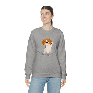 Easily Distracted Unisex Heavy Blend Crewneck Sweatshirt in Sport Grey. Shown is front design featuring a dog waving with the saying "Easily Distracted by Dogs" below it. The back of shirt has the classic Benefit Beagle Logo.