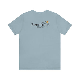 You are my Sunshine Unisex Jersey Short Sleeve Tee in Light Blue. Shown is back of shirt featuring the Sunflower Benefit Beagle Logo. The front showcases a sunflower which is split down the middle and half is made out of paw prints. Underneath is the phrase "You are my Sunshine".