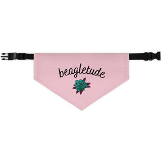 The Signature Tattoo Roses Dog Collar Bandana in Pink. The Signature Tattoo Roses design features the word "beagletude" with a tattoo style rose under it. Comes with adjustable black collar.