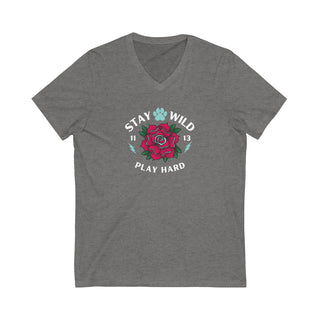 Stay Wild Unisex Jersey Short Sleeve V-Neck Tee in Asphalt. The Stay Wild Design features a tattoo style rose with the phrase "Stay Wild, Play Hard" around it. The back of shirt features the Stay Wild Benefit Beagle Logo Design.