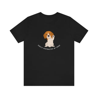 Easily Distracted Unisex Jersey Short Sleeve Tee in Black. Shown is front design featuring a dog waving with the saying "Easily Distracted by Dogs" below it. The back of shirt has the classic Benefit Beagle Logo.