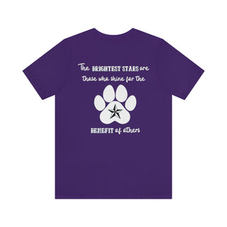 Brightest Star unisex Short Sleeve Tee shirt in purple. The Brightest Star design features a design on the back with the phrase "The brightest stars are those who shine for the benefit of others" with a pawprint and a nautical star.